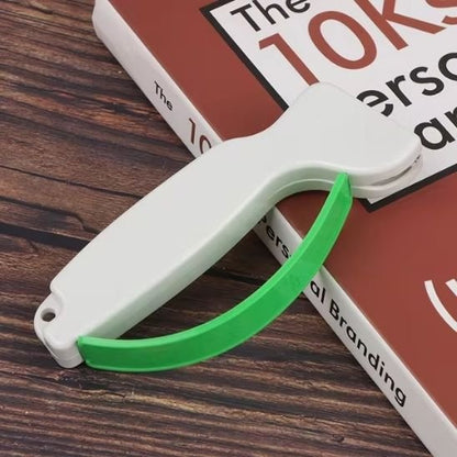 affuteur de couteau vert et blanc