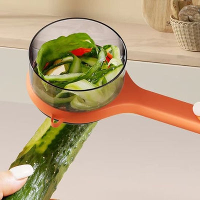 bol intégré transparent de l'éplucheur à légumes 
