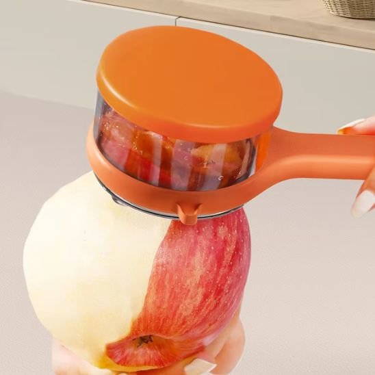 Éplucheur à légumes orange avec couvercle amovible