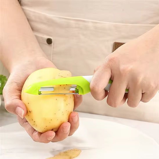Eplucheur epluche bien lisse la pomme de terre