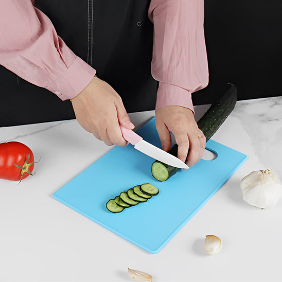 planche a découper bleu protège votre couteau