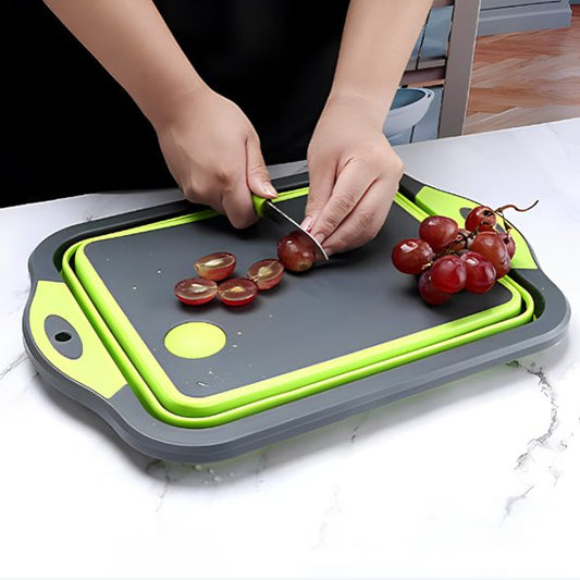 Planche à découper pliable stabilise aliments pendant la découpe