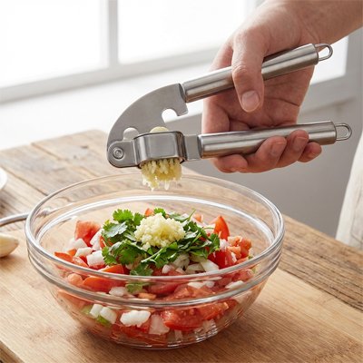 Presse ail presser direcement sur les aliments